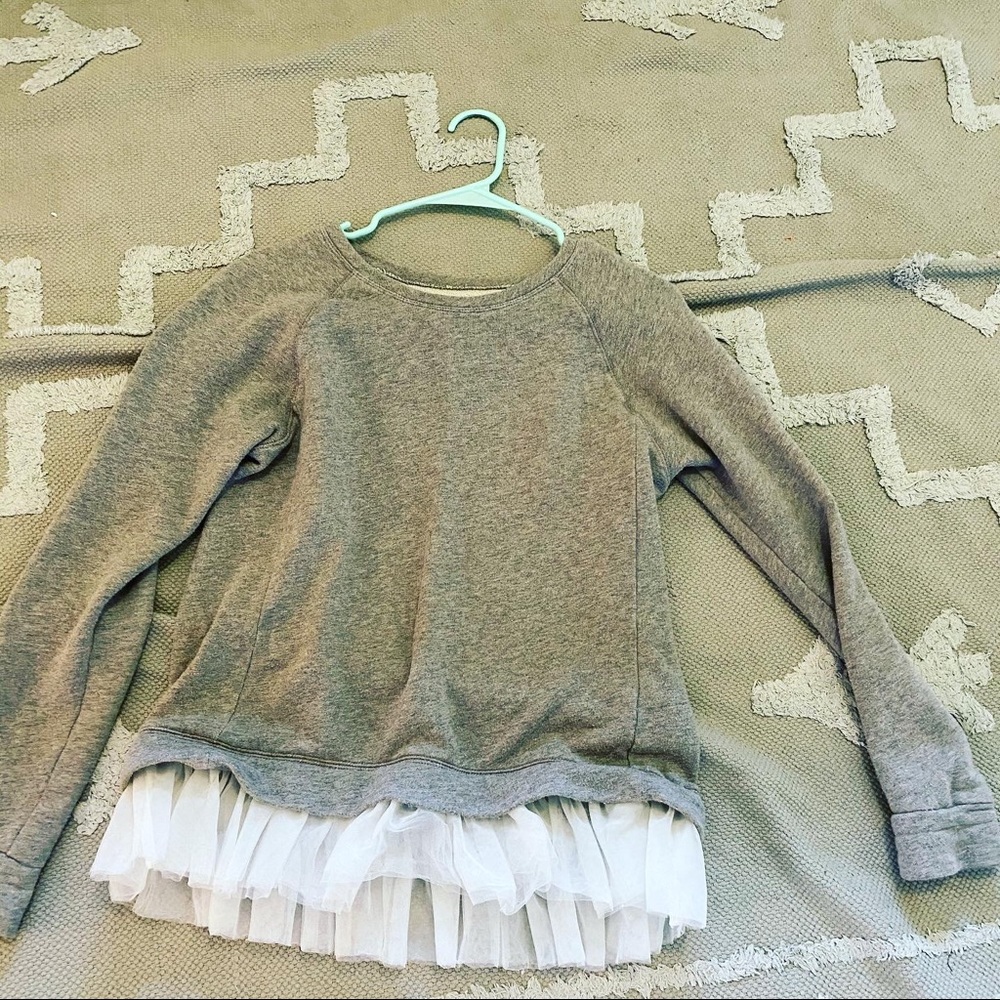 Gray long sleeve shirt with tutu out the end